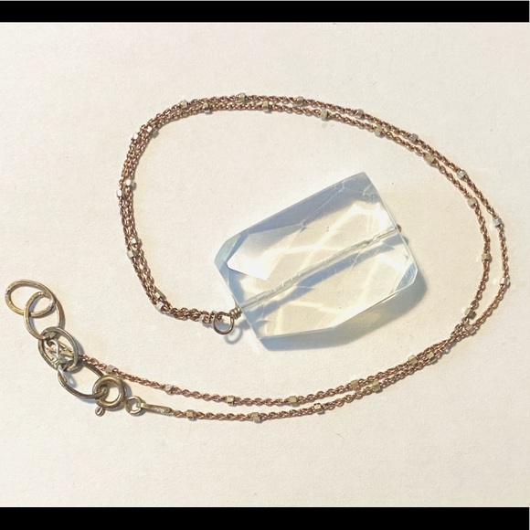 Clear crystal quartz on sterling chain with tiny beads reflecting light - Picture 2 of 5